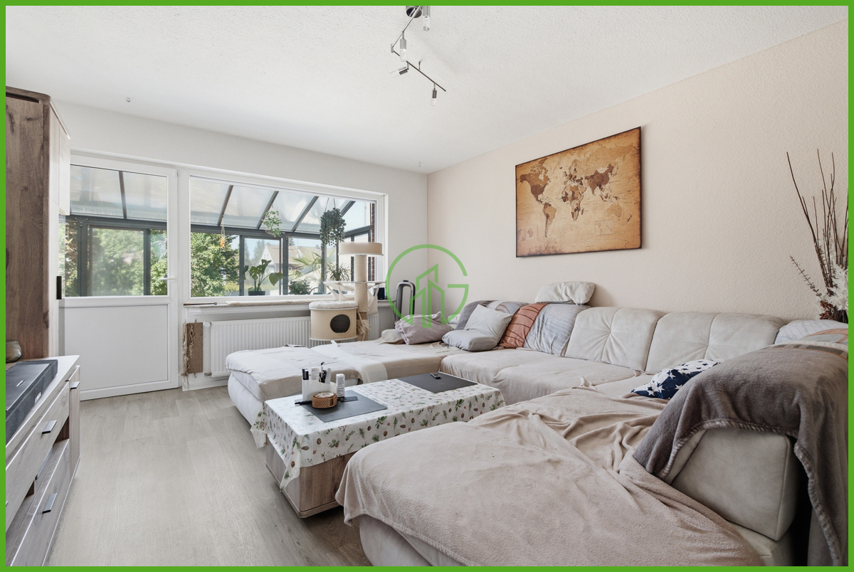 # NIEDERAU # Einfamilienhaus, ca. 138 m², mit Terrasse, großem Garten, Garage und Wintergarten. - Foto 1